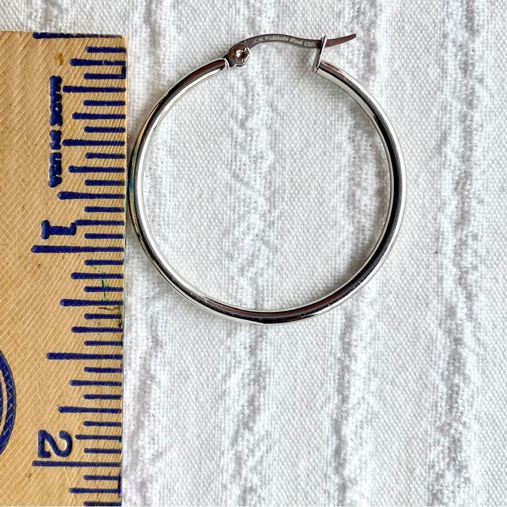 Jacmel Mauritius | Stainless Steel Heart & Hoop Mismatched Earrings 1 3/8" Long - Picture 5 of 6